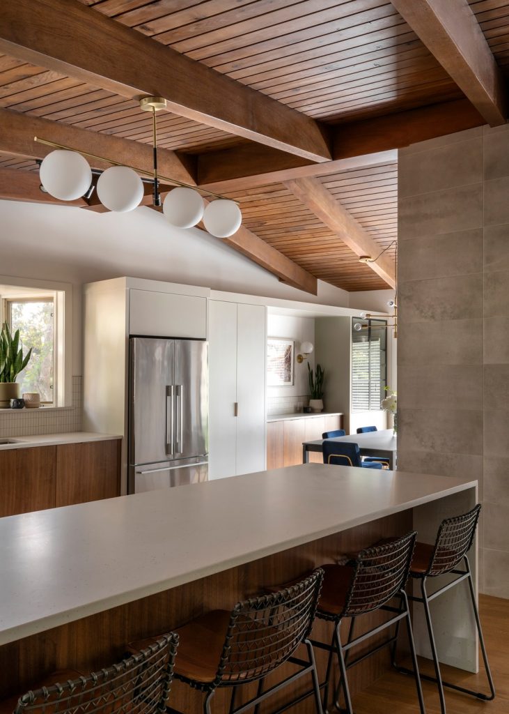 Saville Homes renovated mid-century modern kitchen with polished concrete countertops